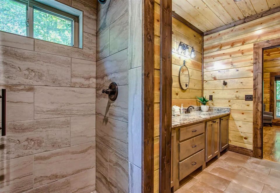Luxurious and functional, this shower area is designed to provide a refreshing experience.