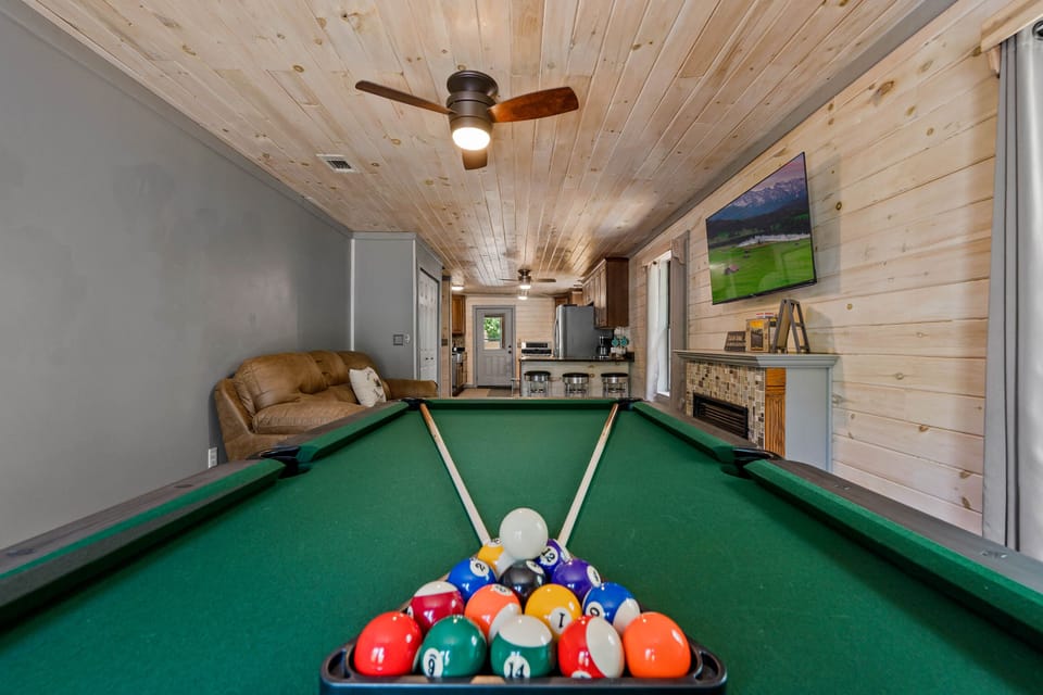 Enjoy games of pool in the entertainment room!