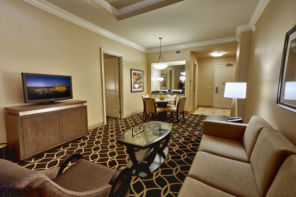 Rodeo Director Suite | Living room | 42-inch flat-screen TV with digital channels, TV, pay movies