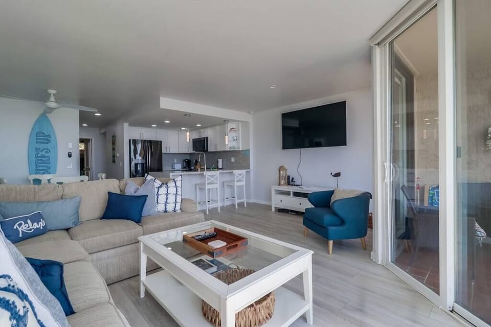 The condo has an open floor plan, so you are never out of the action.