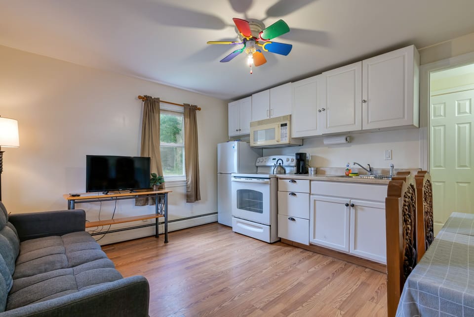 Kitchen with Full sized Refrigerator, Microwave, and Coffee Maker. 
