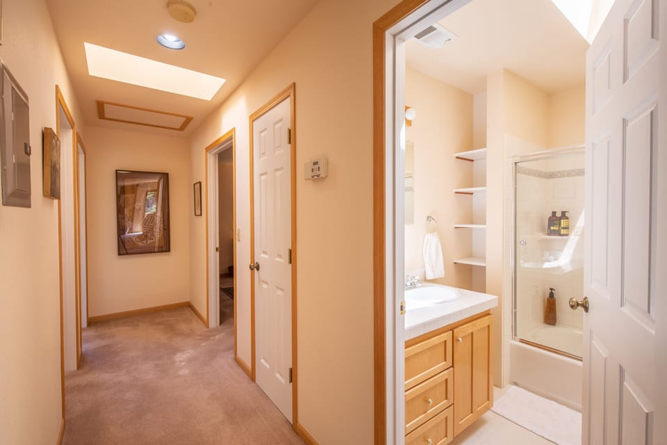 Hallway to bedrooms & first bathroom