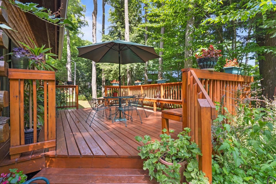 Step onto the spacious deck w/ outdoor dining, surrounded by tall trees & fresh forest air.