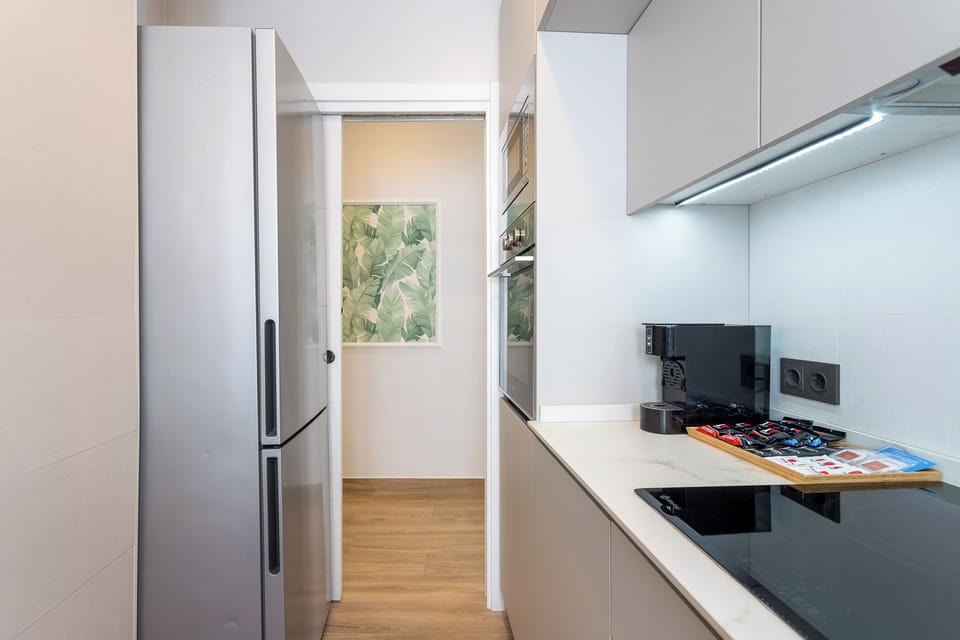 Family Apartment, 2 Bedrooms, Beachside | Private kitchen | Full-size fridge, microwave, coffee/tea maker, electric kettle