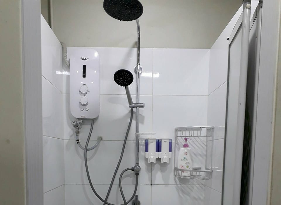 Basic Shared Dormitory | Bathroom | Shower, free toiletries, towels, soap
