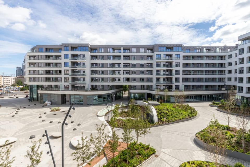 The modern building is located close to the city beach.