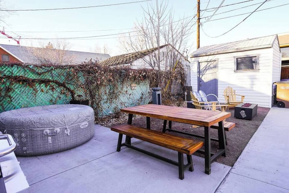 Blow up hot tub fits up to 4 adults; spa towels and outdoor plastic dishes are in apartment