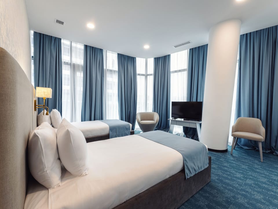 Deluxe Twin Room | Premium bedding, minibar, in-room safe, desk