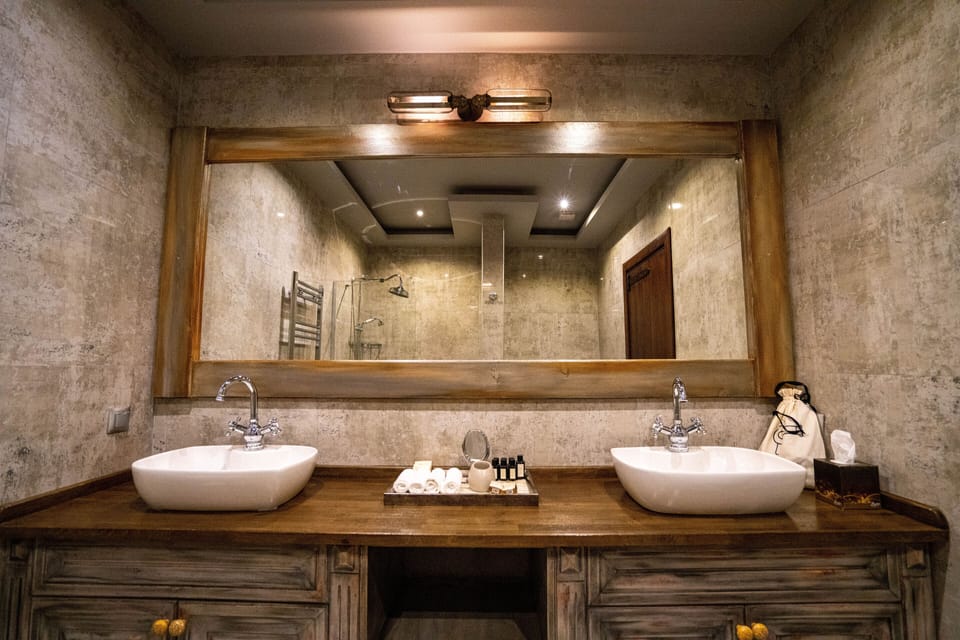 Deluxe Double Room | Bathroom | Separate tub and shower, deep soaking tub, rainfall showerhead
