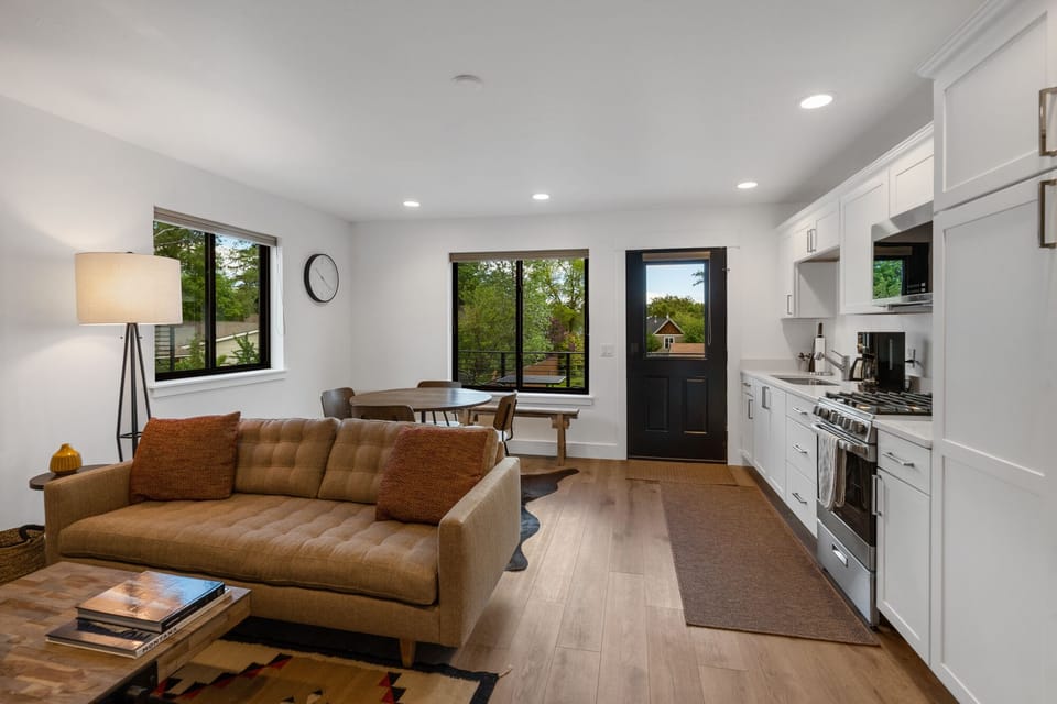 Open concept living, dining and kitchen upon entering the home!