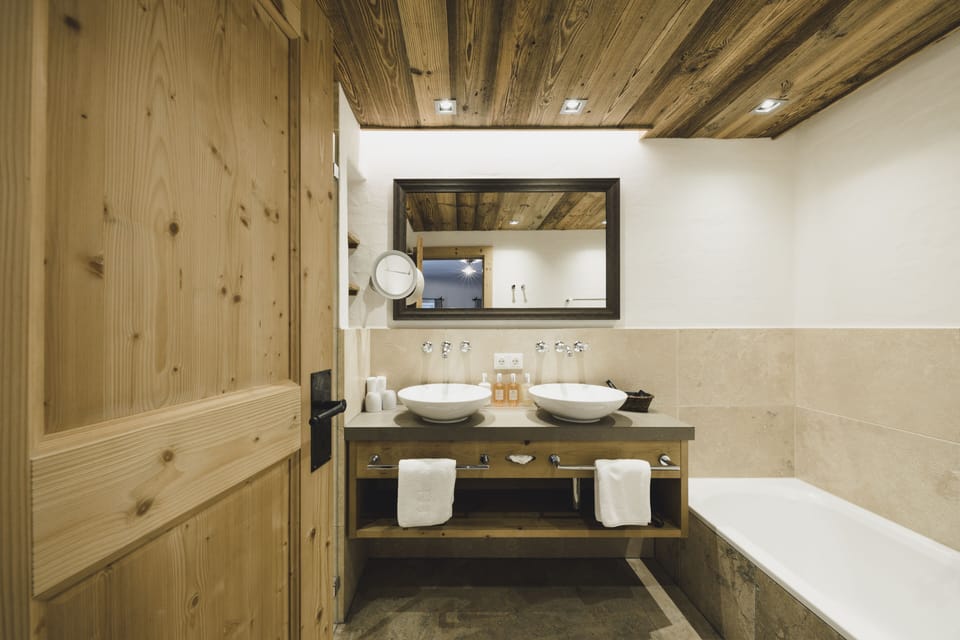 Suite, 2 Bedrooms | Bathroom | Rainfall showerhead, designer toiletries, hair dryer, bathrobes