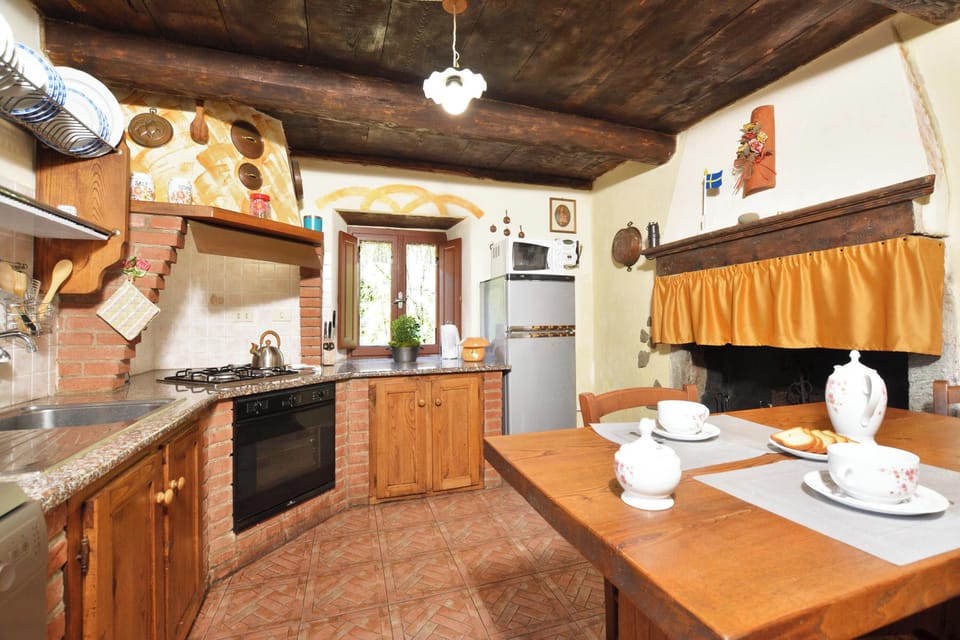 Family House, 3 Bedrooms, Balcony (Casa Le Meriche) | Private kitchen | Fridge, microwave, stovetop, dishwasher