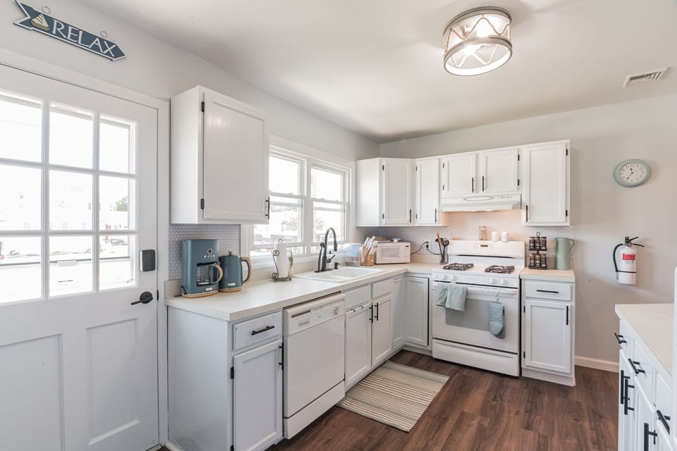 Bright & fully equipped kitchen with everything you will need for family meals