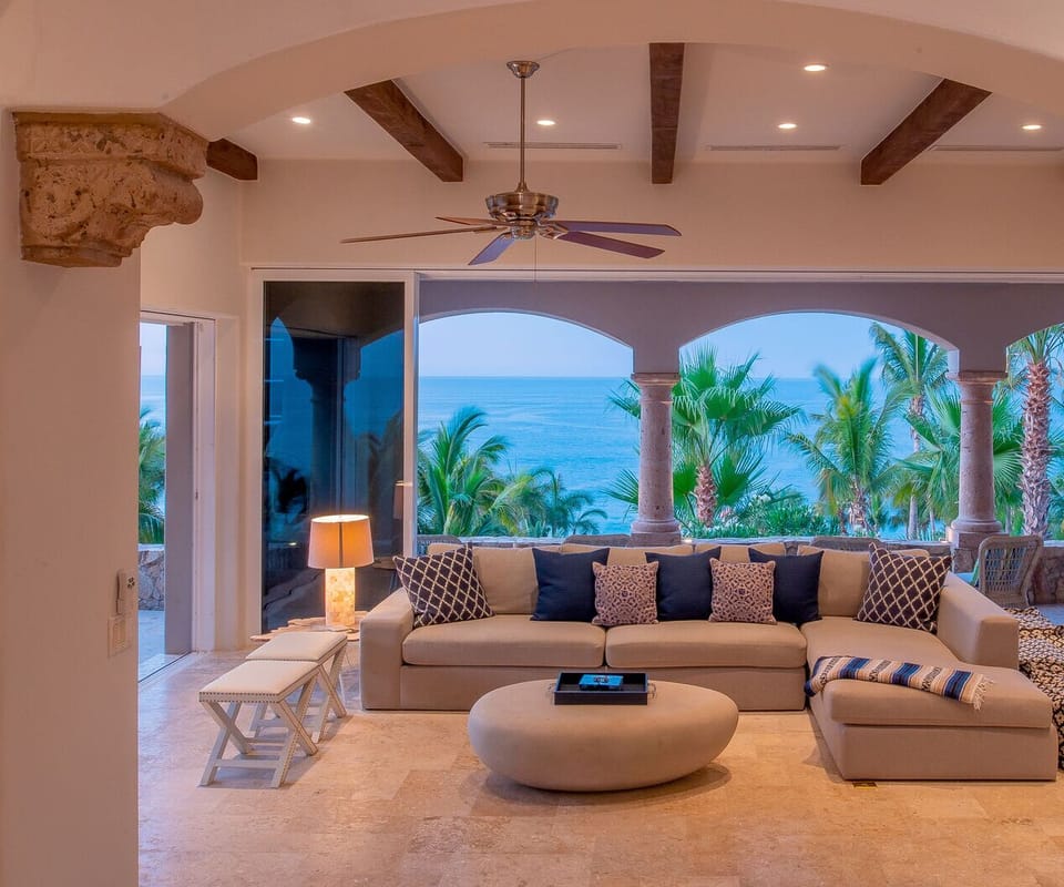 Another view of the sectional couch in the seating area by the patios.
