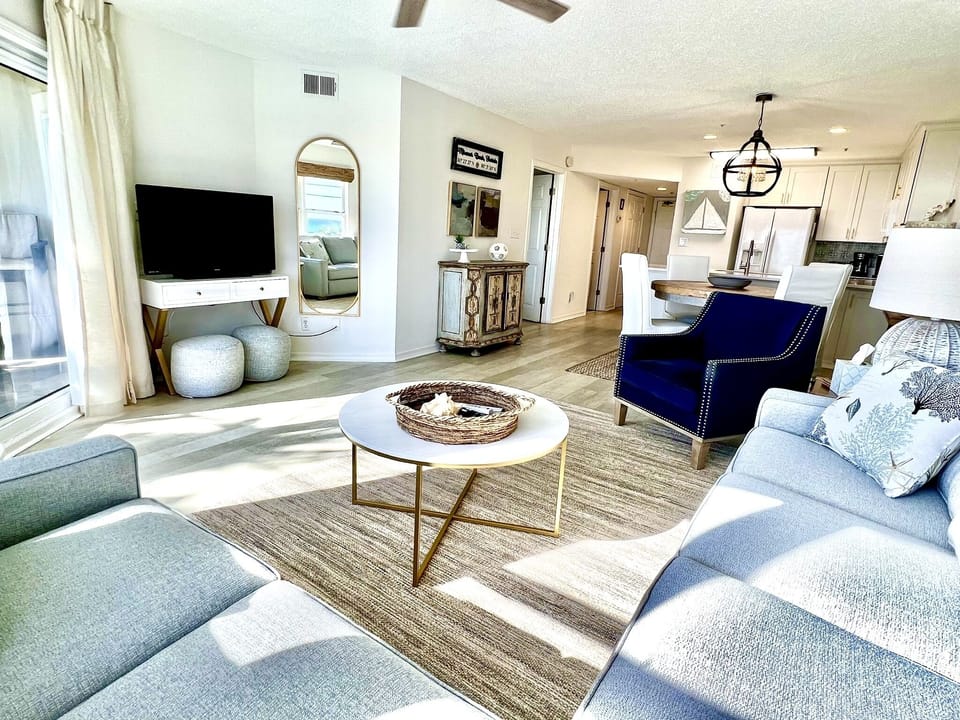 View of the condo from the living room to the kitchen. 