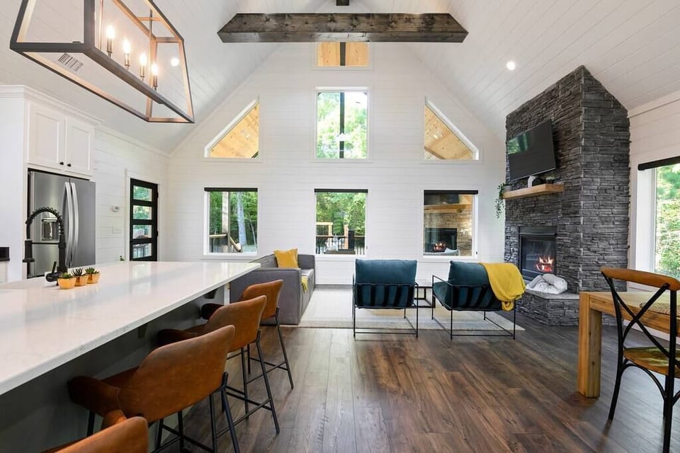 Feel immersed in nature, with windows wrapping around the entire cabin.