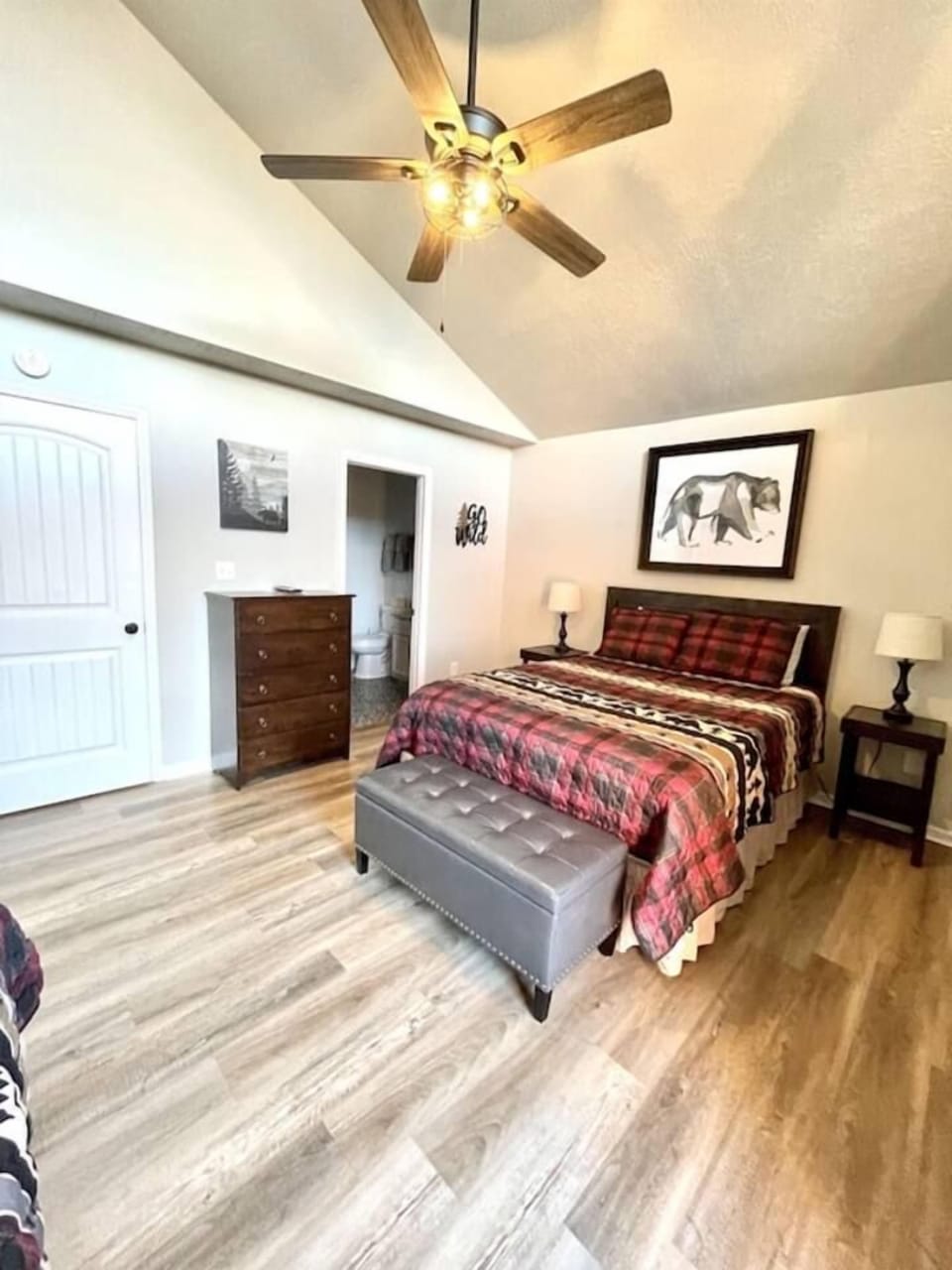 Large primary with queen, twin daybed with trundle, and smart tv