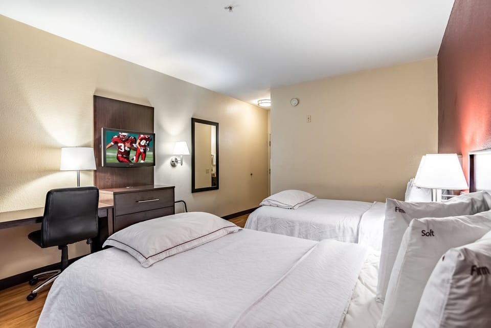 Premium Room, 2 Double Beds (Upgraded Bedding & Snack, Smoke Free) | Desk, laptop workspace, blackout drapes, iron/ironing board