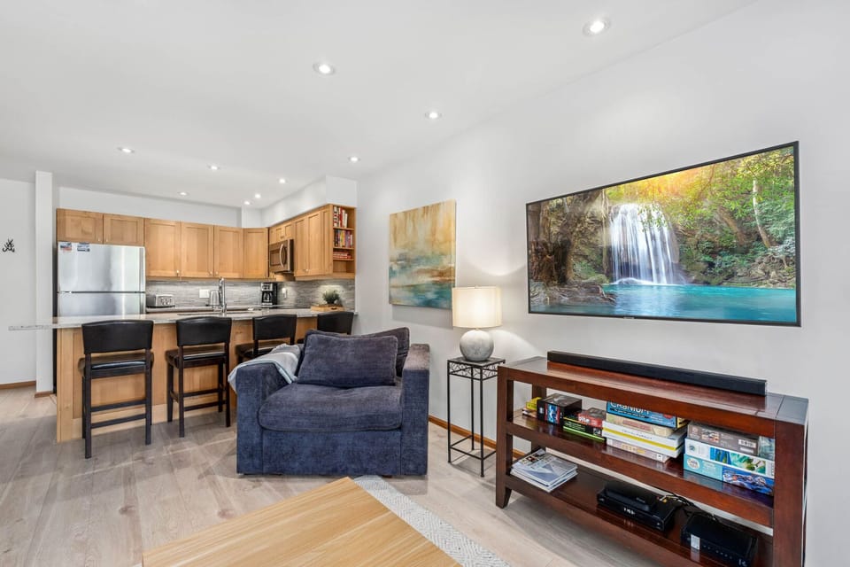 Spacious open-concept living with smart TV & alpine charm.
