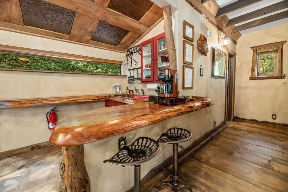 Unique artisan kitchen featuring stunning live-edge wood counters
