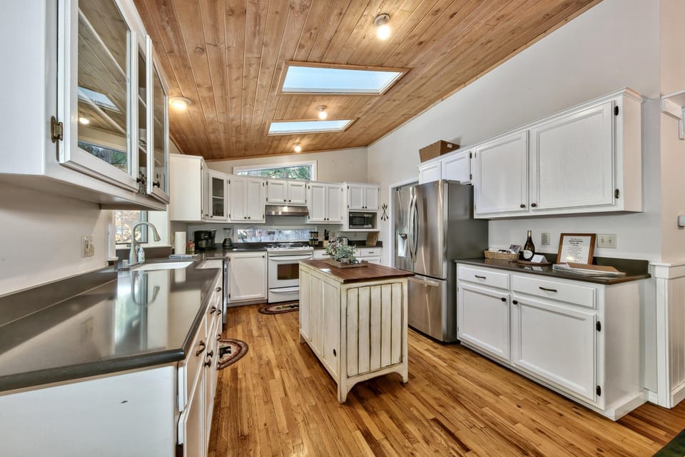 Enjoy the spacious kitchen with plenty of room to cook and enjoy your vacation.