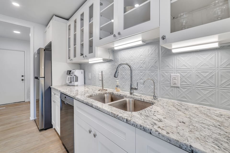 Kitchen featuring all stainless steel appliances