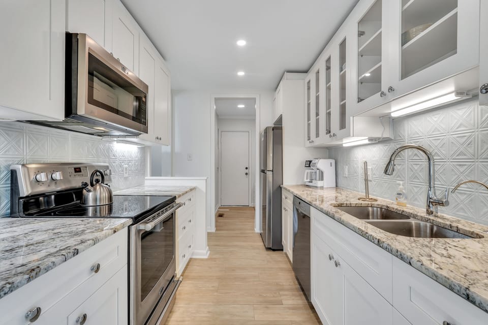 Kitchen featuring all stainless steel appliances