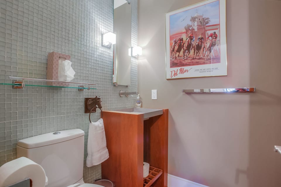 Half bathroom by the kitchen area.