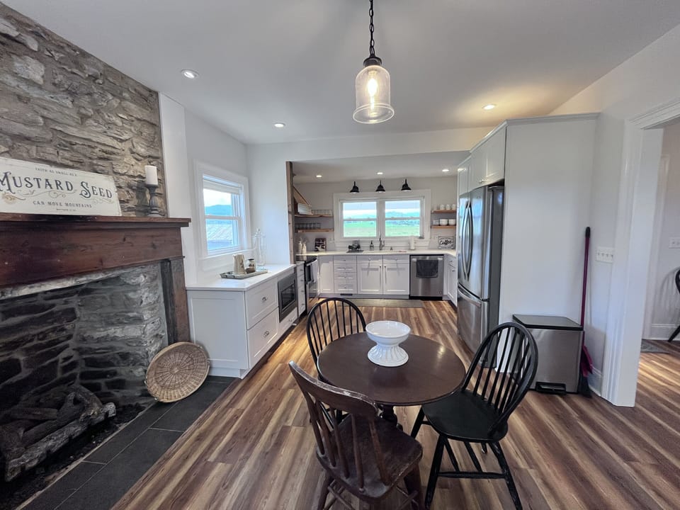 Breakfast table & fully stocked kitchen.