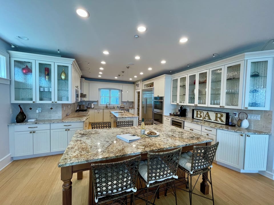 Beautiful chefs kitchen with walk-in pantry