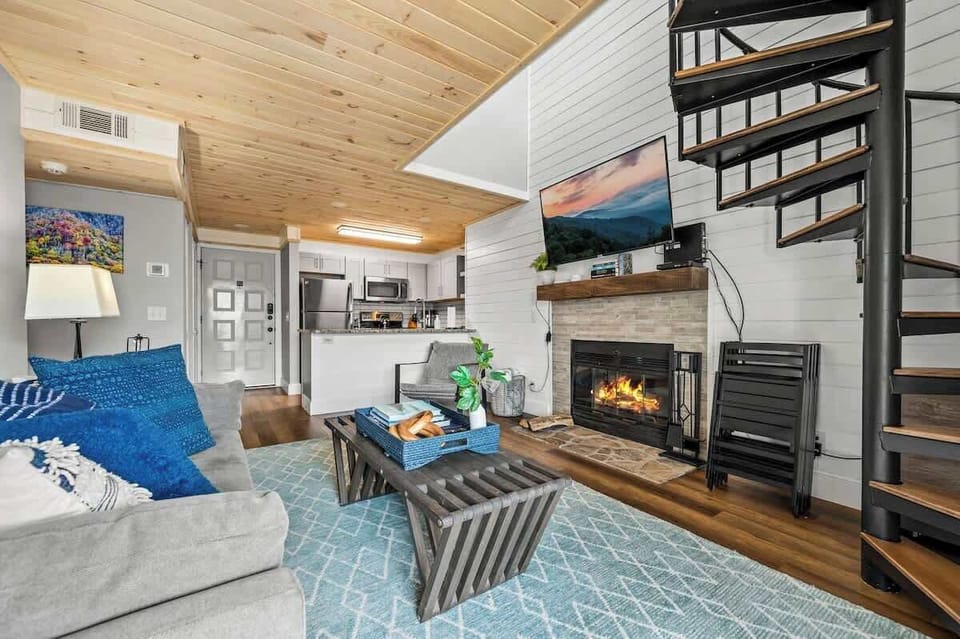 Second view of living area with kitchen