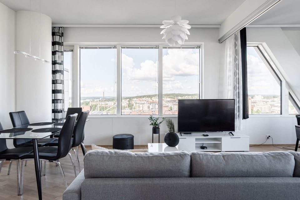 Panoramic Apartment | Living area | 50-inch Smart TV with cable channels, TV