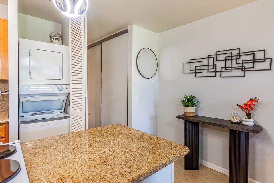 Enjoy the convenience of in-unit laundry with a stacked washer and dryer, plus extra storage space to keep your vacation essentials organized and easy to reach.