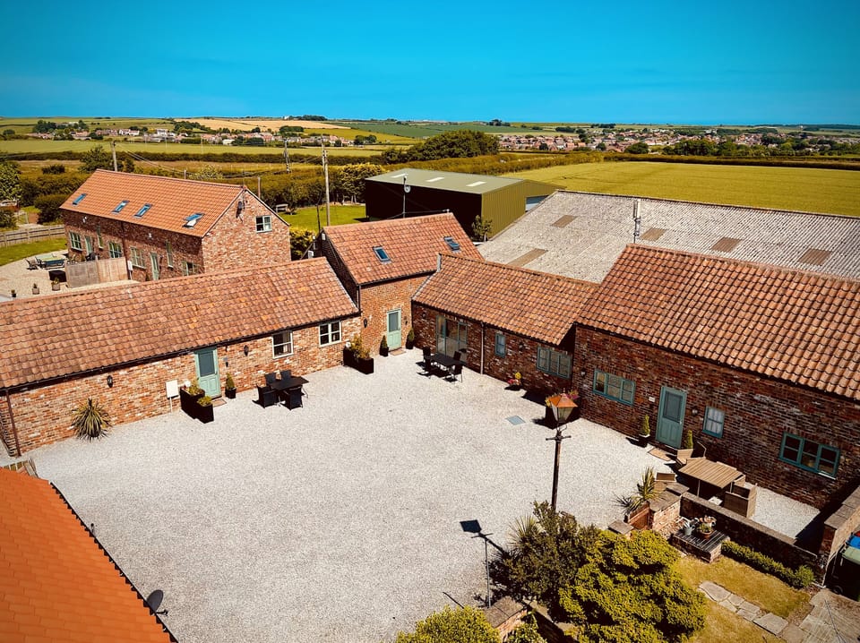Shared courtyard with each cottage having its own outside seating area