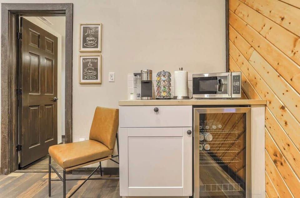 We happily provide coffee, a mini fridge, microwave, and some basic items such as a wine opener!