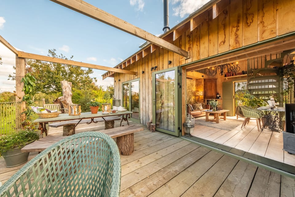 The beautiful balconied terrace with doors into the open-plan living area