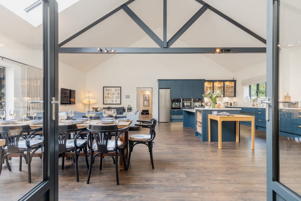 The open-plan kitchen, sitting and dining area
