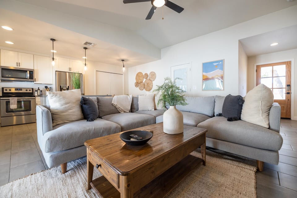 Together is our favorite place to be... the living room, kitchen, and dining area, are all connected