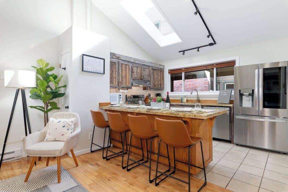 Full kitchen with brand new appliances and anything you could possibly need for cooking.  Updated with new smart appliances: can connect with your iphone to tell freezer to make more ice, air frying ability with oven and silent dishwasher.