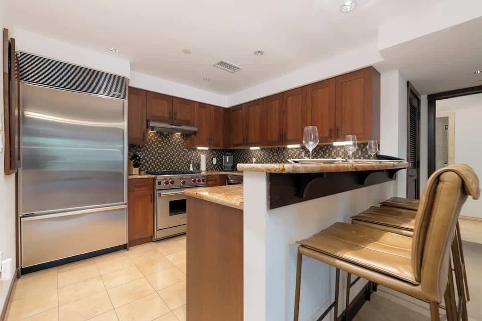 Full sized professional grade kitchen with Wolf brand appliances.
