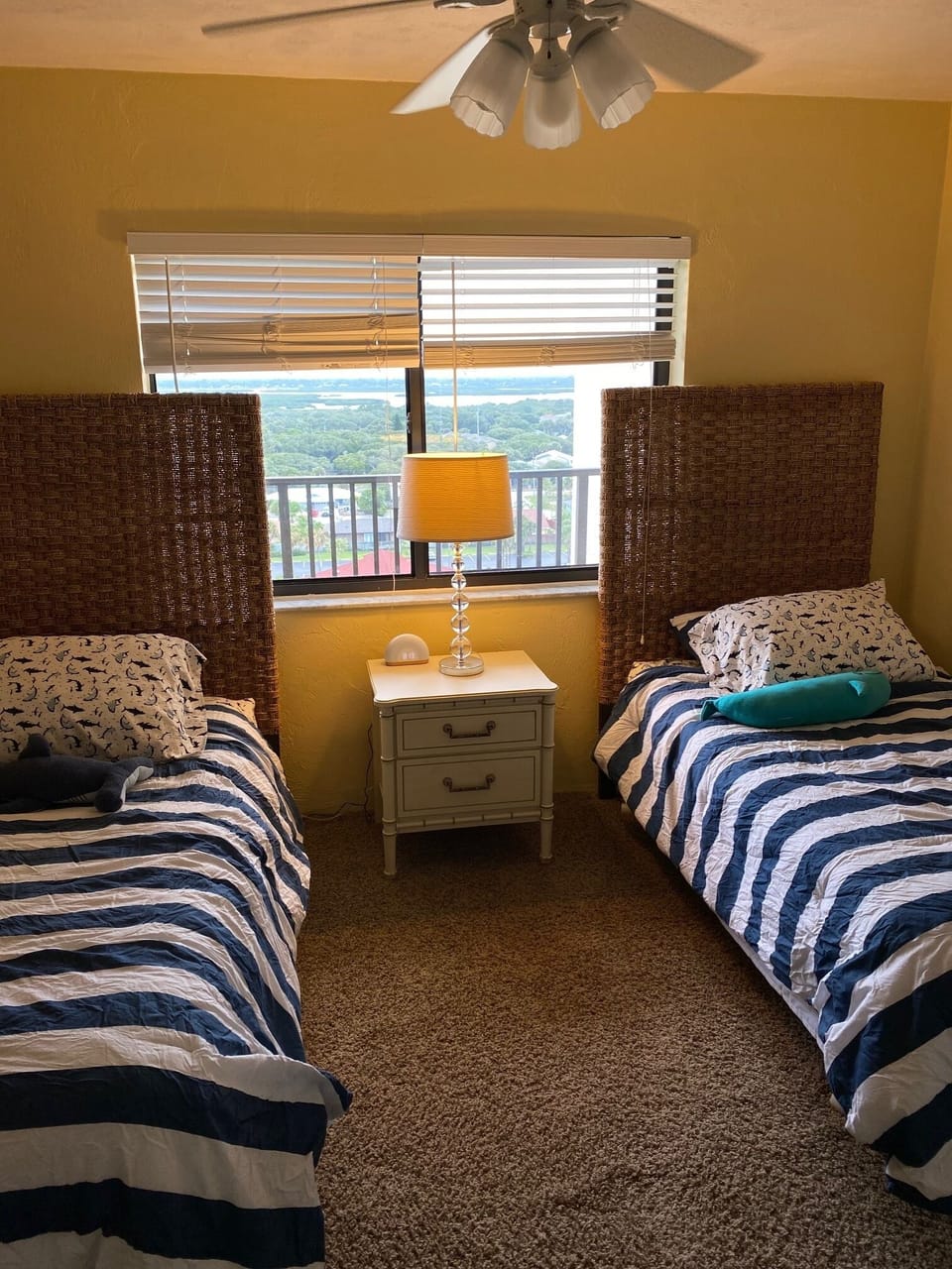 Guest bedroom looks out on the intracoastal waterway and lagoon.