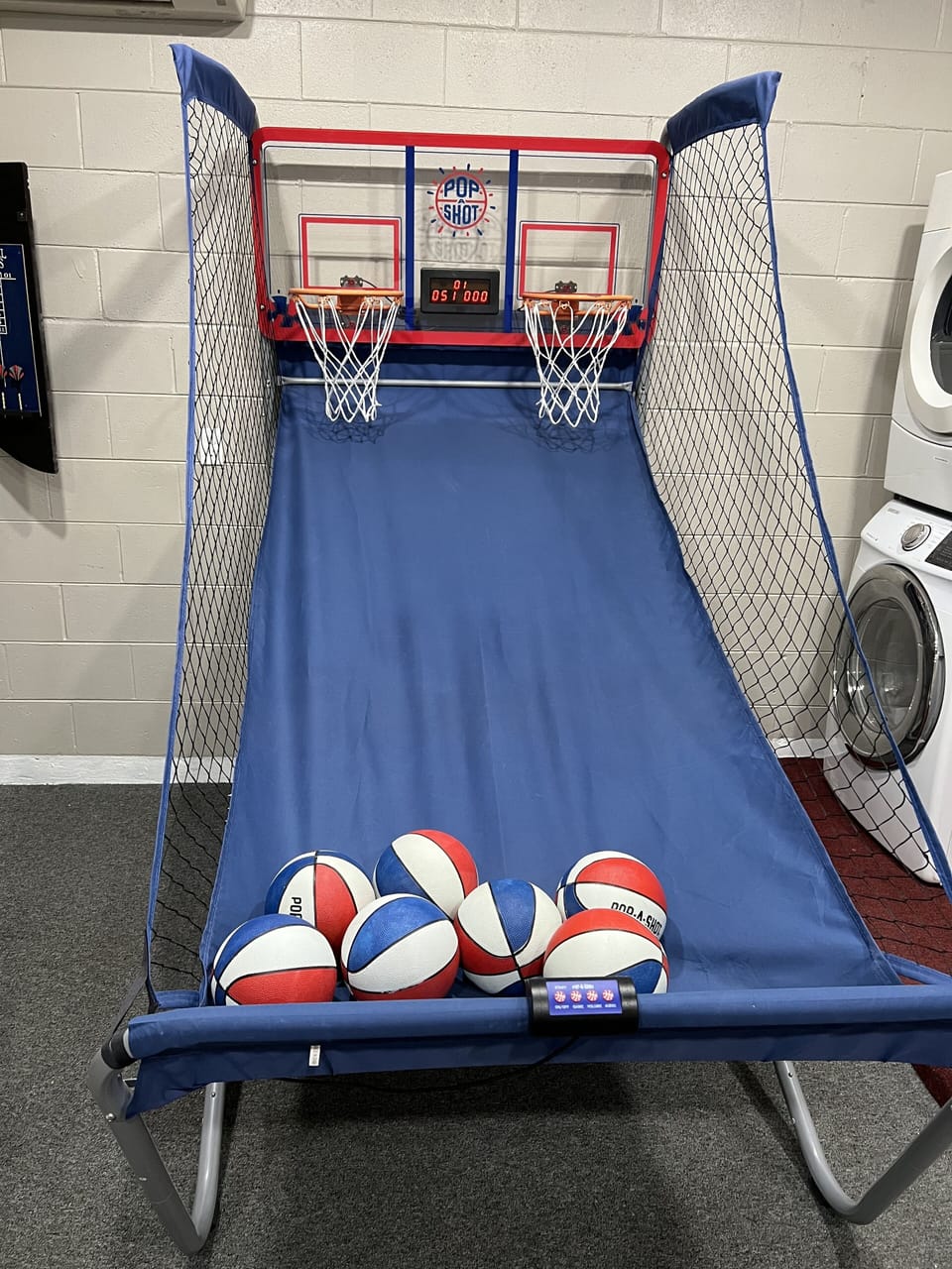 Basketball in the  game room.