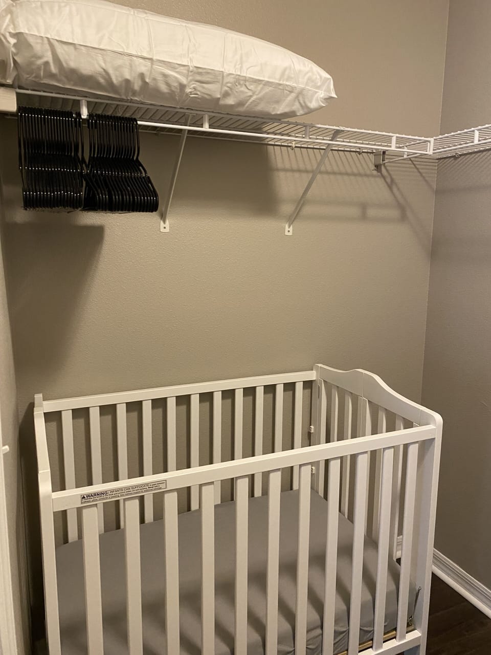 Crib with lockable wheels available upstairs in en-suite closet. 