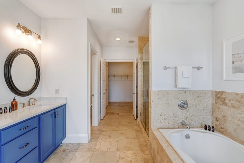 Walk-in closet at the back of the ensuite bathroom.