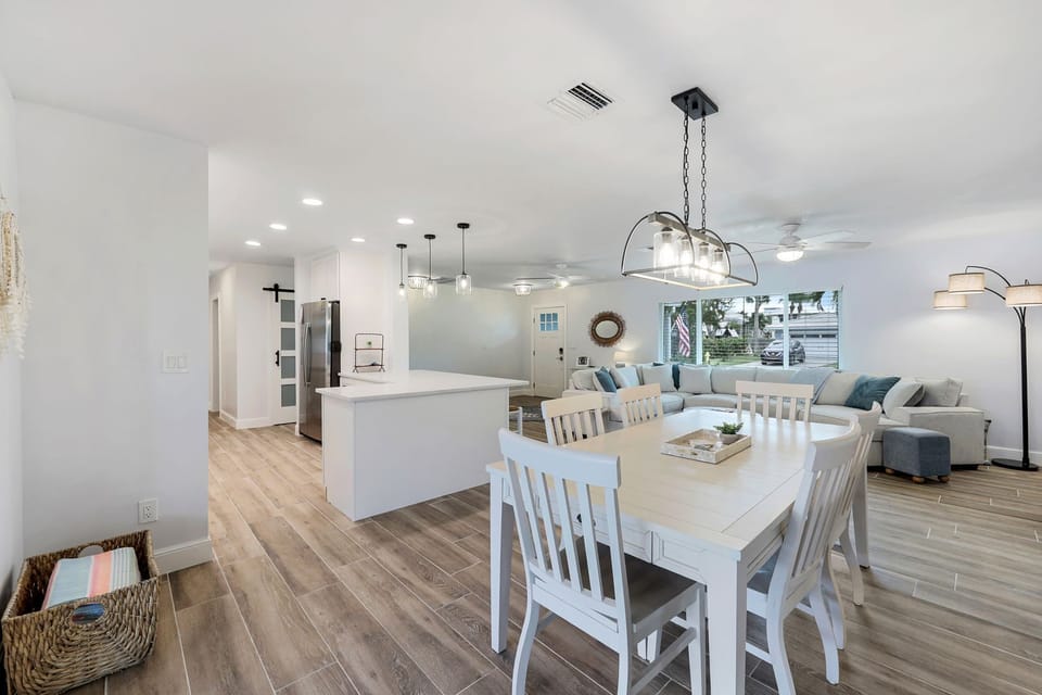 Bright and airy flow from kitchen to dining—perfect for morning coffee or unwinding after a day on the water