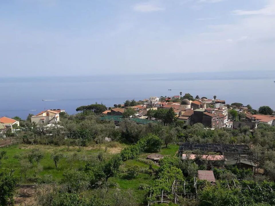 Sky, Water, Cloud, Plant, Ecoregion, Azure, Building, Highland, Land Lot, Coastal And Oceanic Landforms