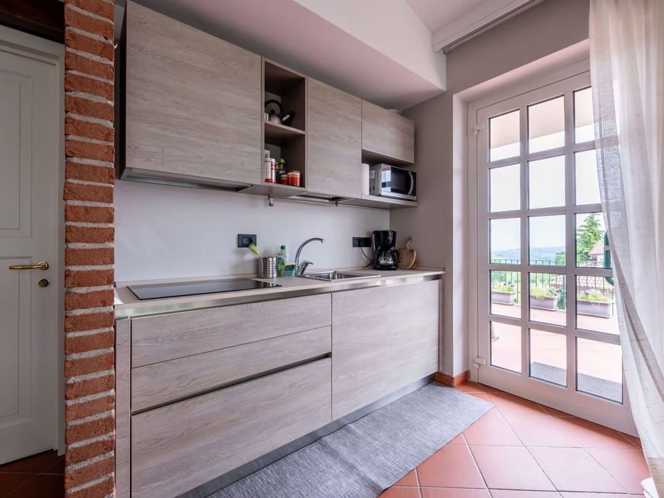 Property, Cabinetry, Window, Countertop, Wood, Interior Design, Shelf, Architecture, Floor, Shelving