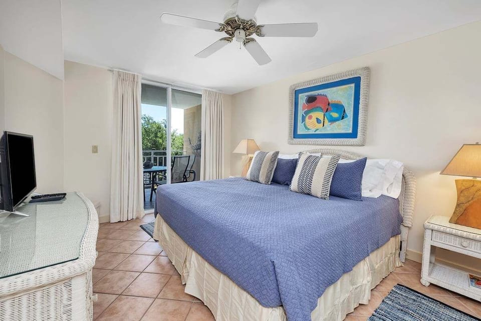 North Breakers 309 - Primary Bedroom with king bed and patio access