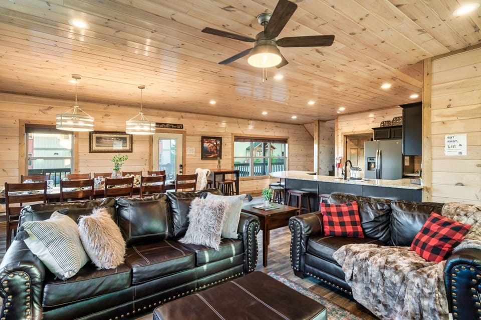 Family Cabin | Living room | 65-inch Smart TV with cable channels, TV, fireplace