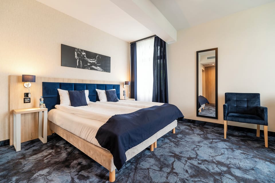 Superior Room | Desk, laptop workspace, blackout drapes, soundproofing